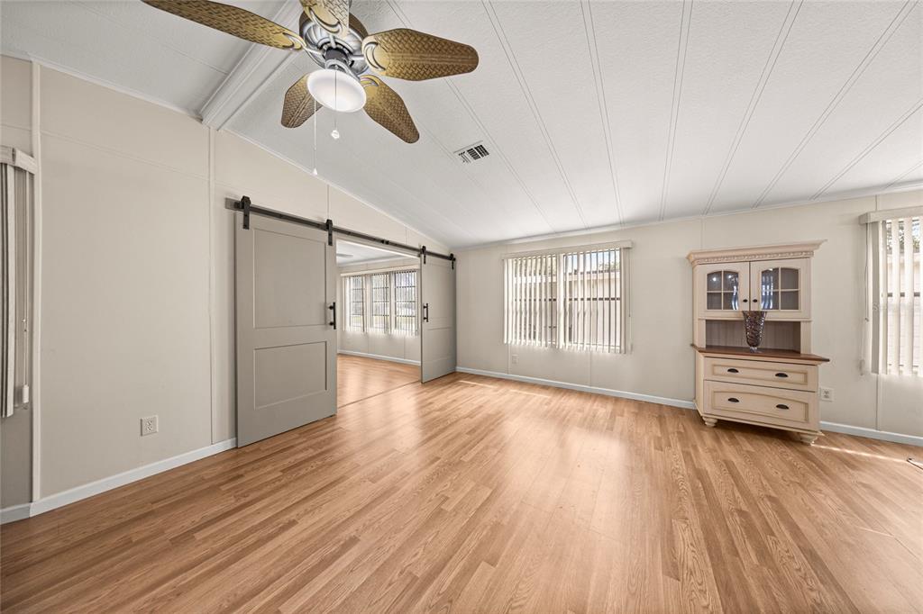 712 Devon Drive Lady Lake, FL 32159 - Photo 9 of 31 a view of livingroom with hardwood