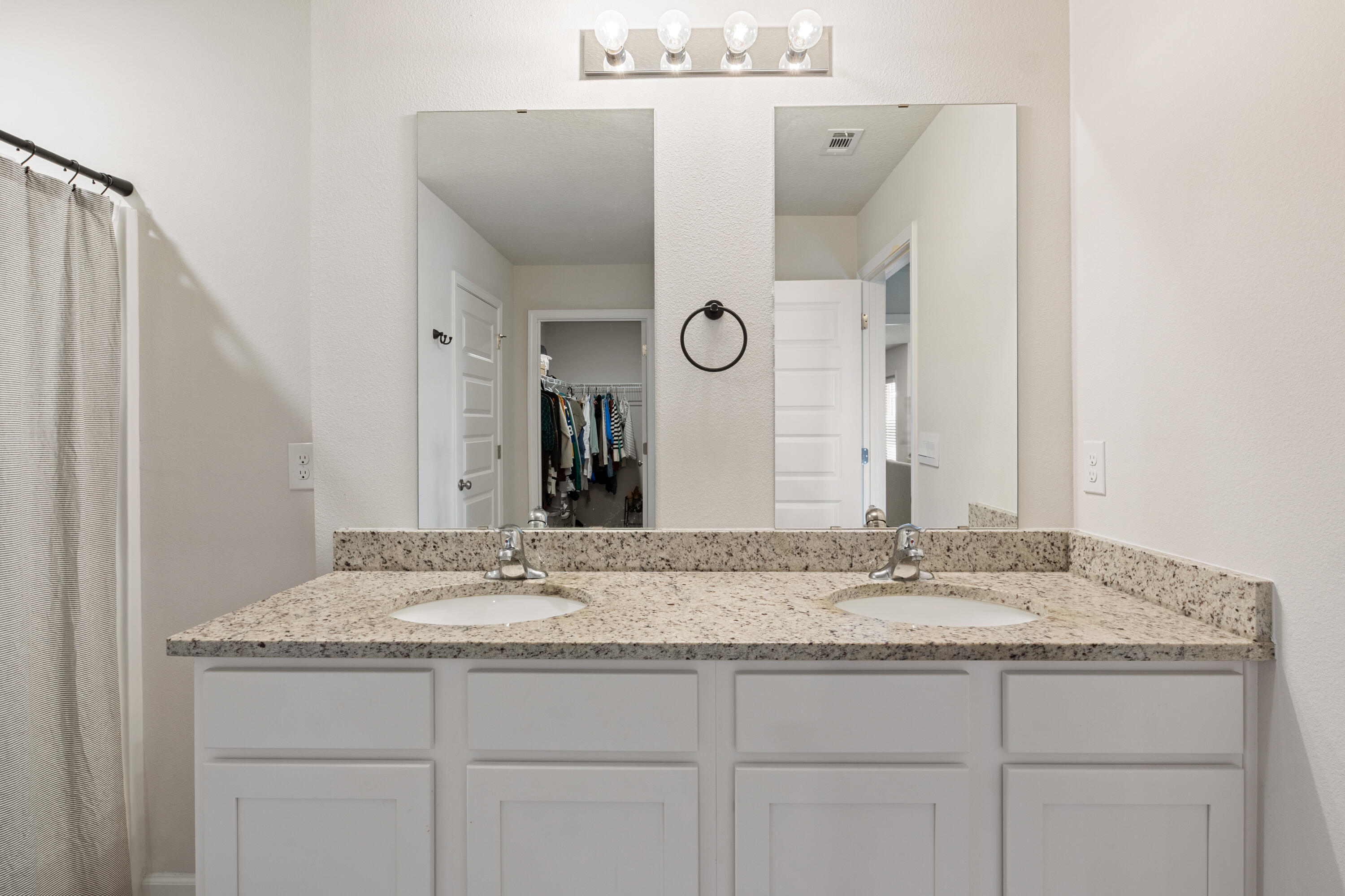 848 Otto Loop Crestview, FL 32539 - Photo 17 of 26 a bathroom with a granite countertop sink and a mirror