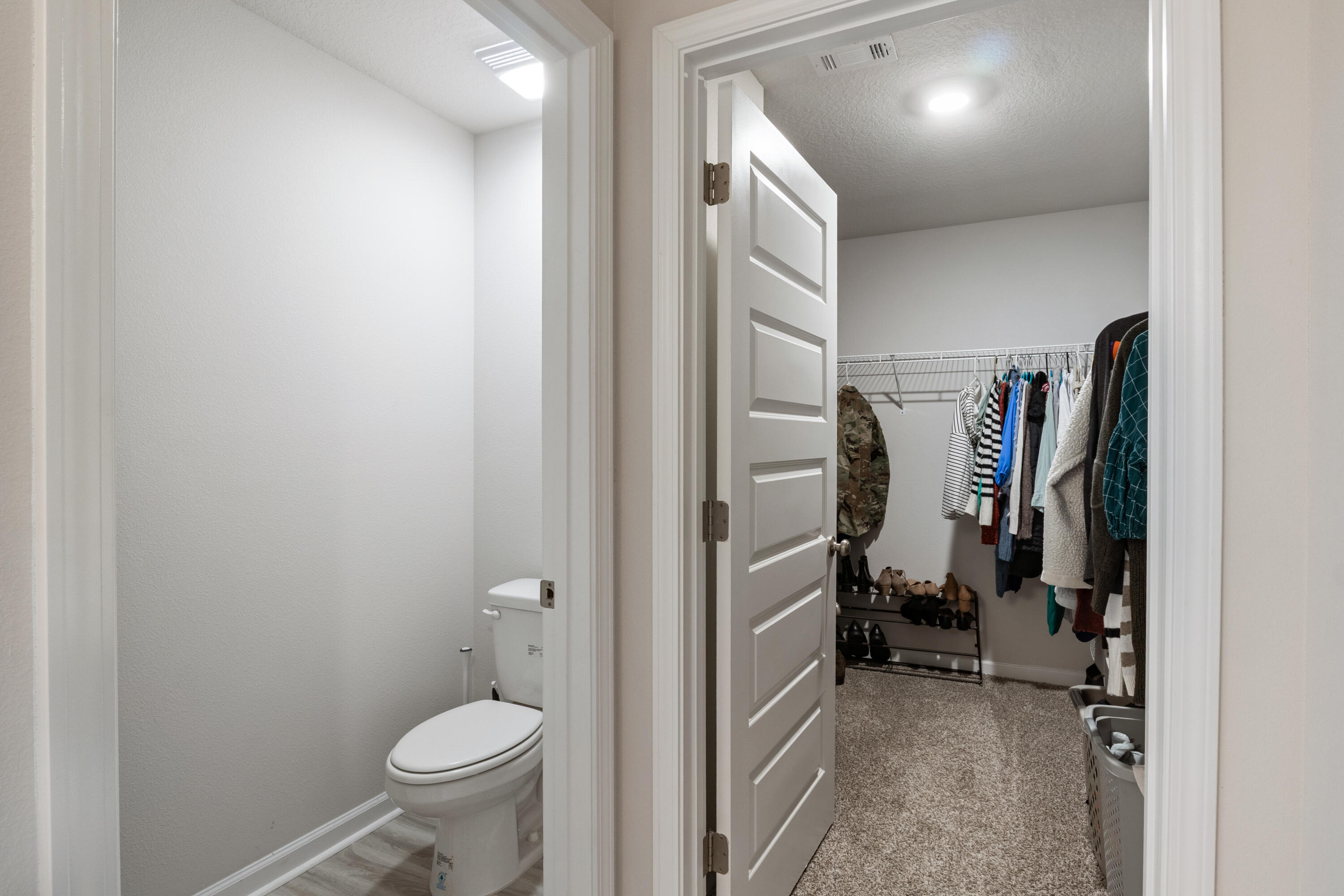 848 Otto Loop Crestview, FL 32539 - Photo 18 of 26 a view of a bathroom with a toilet and a shower