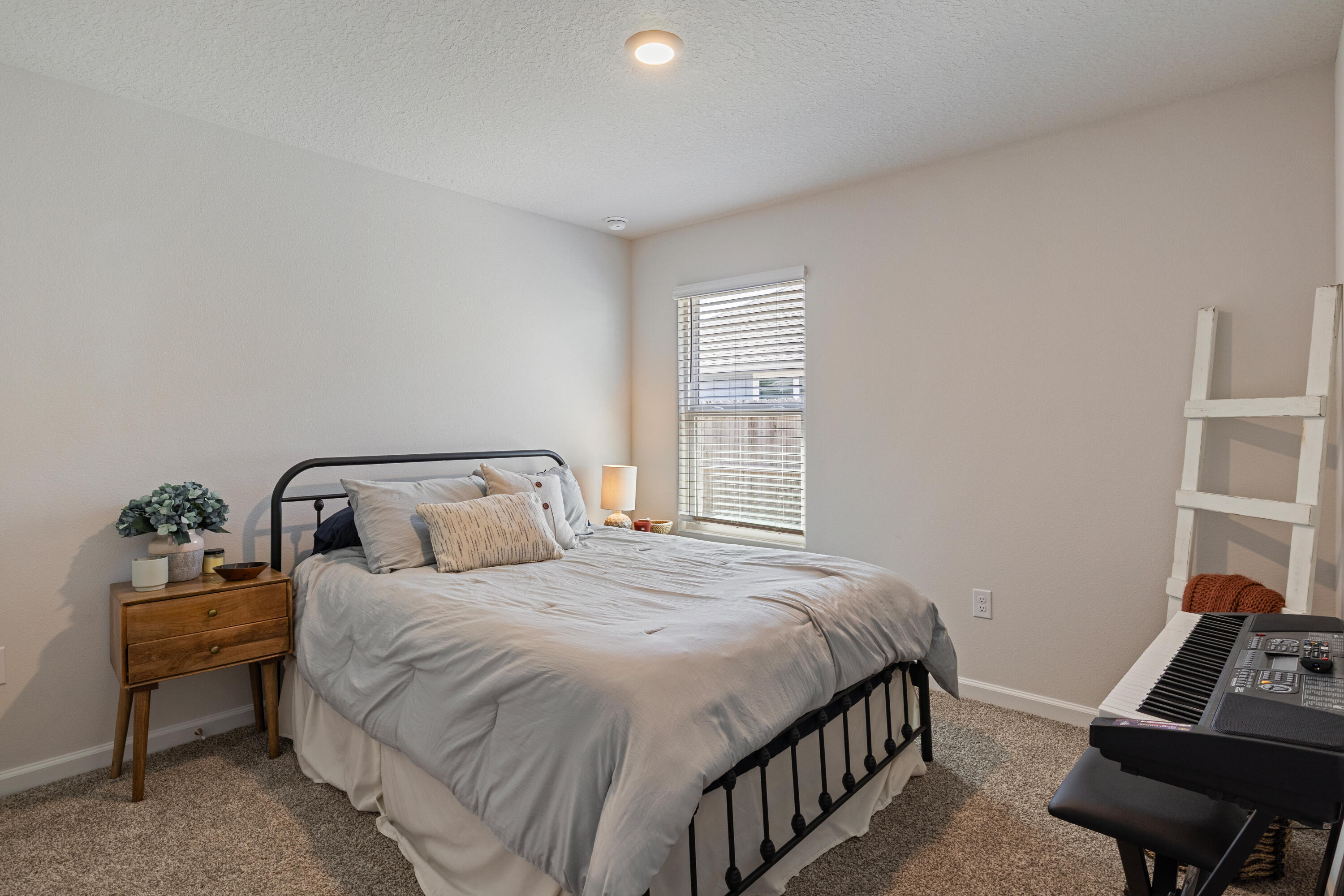 848 Otto Loop Crestview, FL 32539 - Photo 19 of 26 a bedroom with a bed and a window