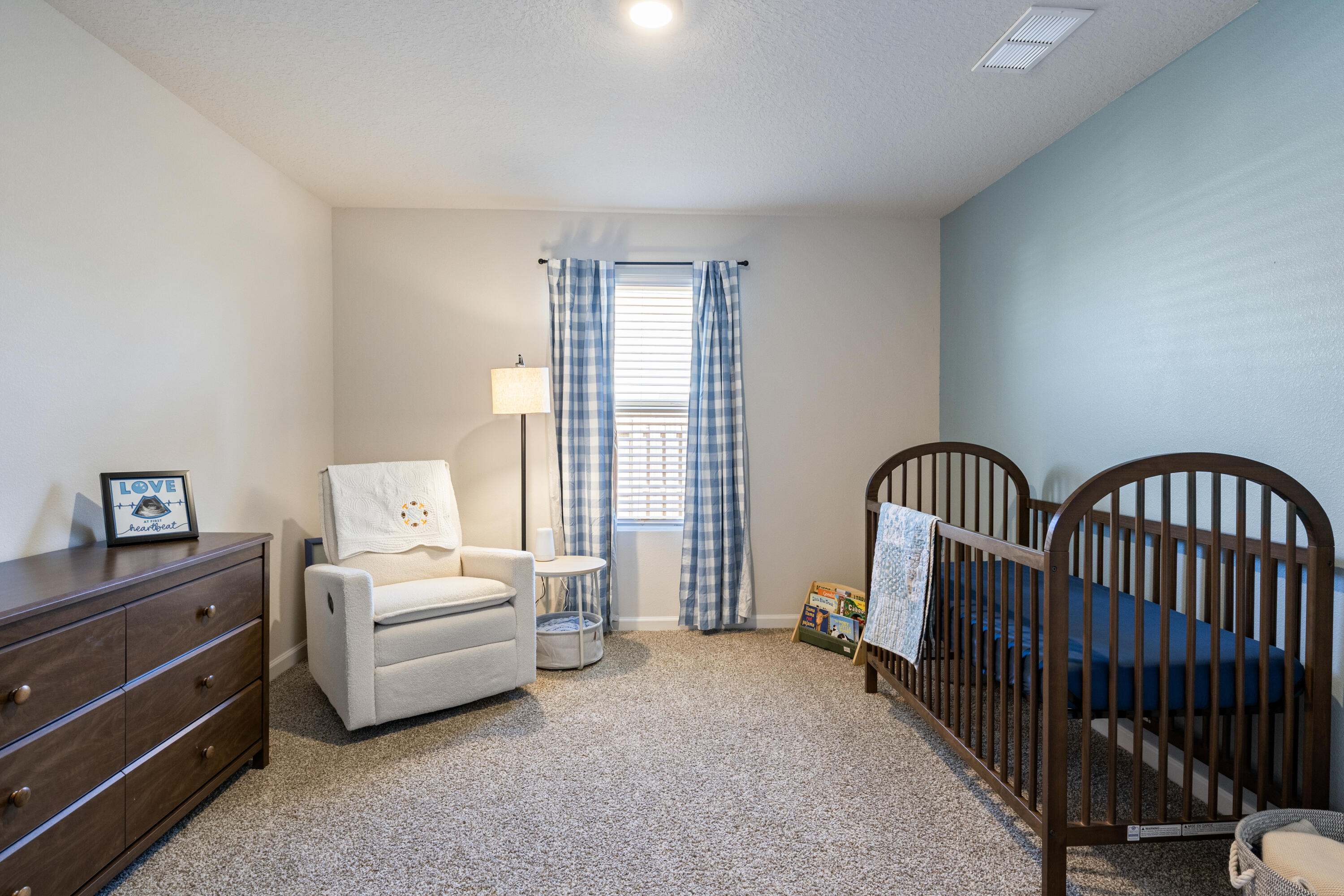 848 Otto Loop Crestview, FL 32539 - Photo 21 of 26 a bedroom with furniture and a window