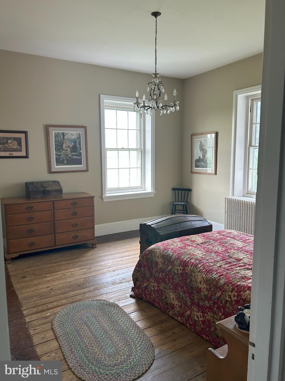 842 Salem Quinton Road Quinton, NJ 08079 - Photo 14 of 21 a bedroom with a bed chandelier and window
