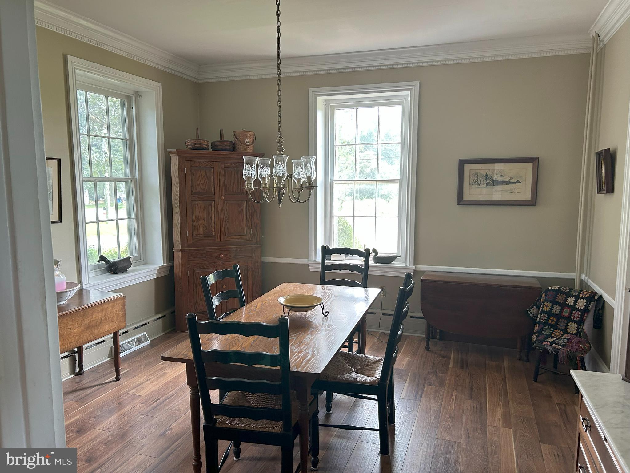842 Salem Quinton Road Quinton, NJ 08079 - Photo 16 of 21 a view of a dining room with furniture window and wooden floor