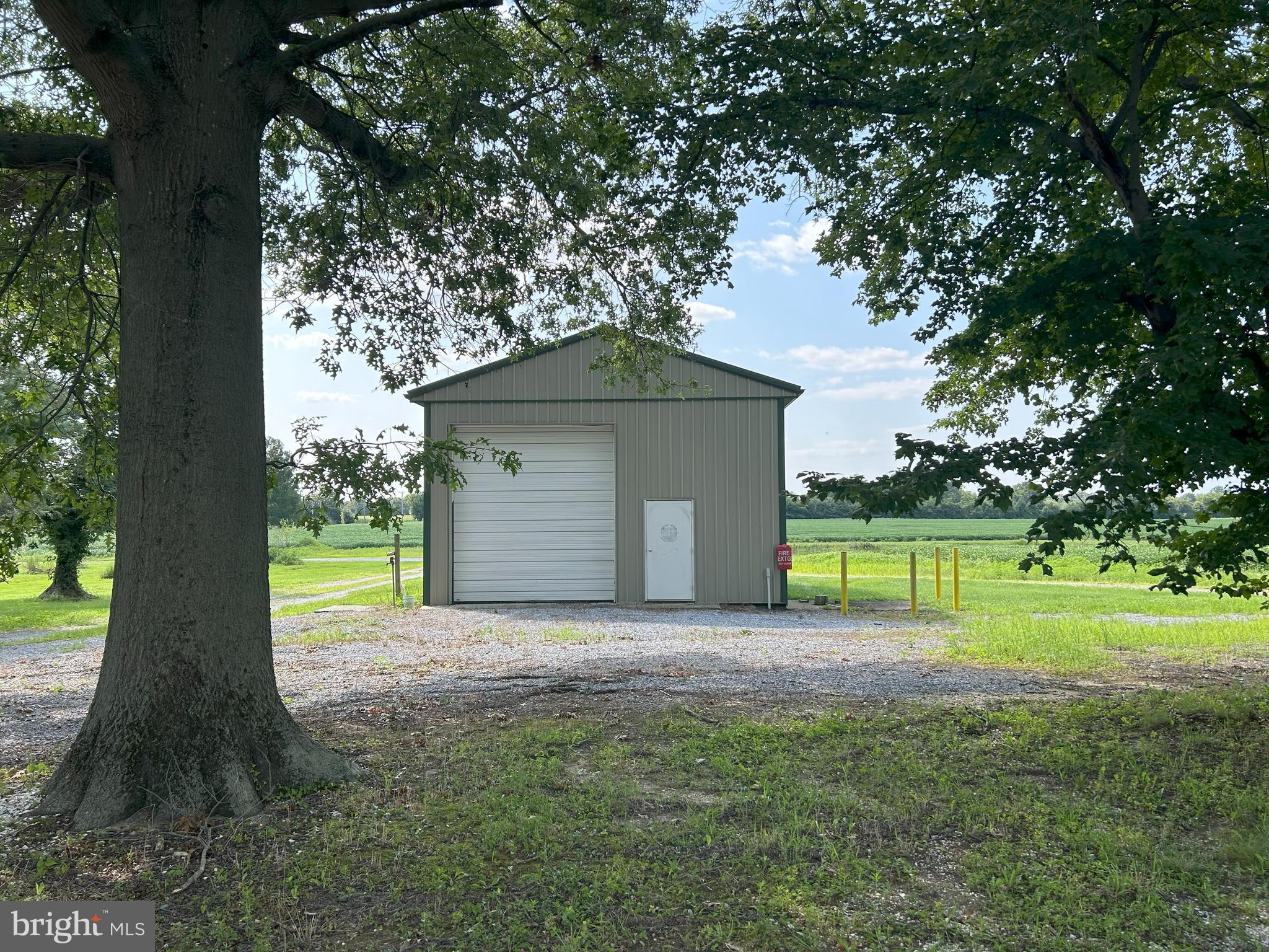 842 Salem Quinton Road Quinton, NJ 08079 - Photo 10 of 21 a small house with a big yard and large trees