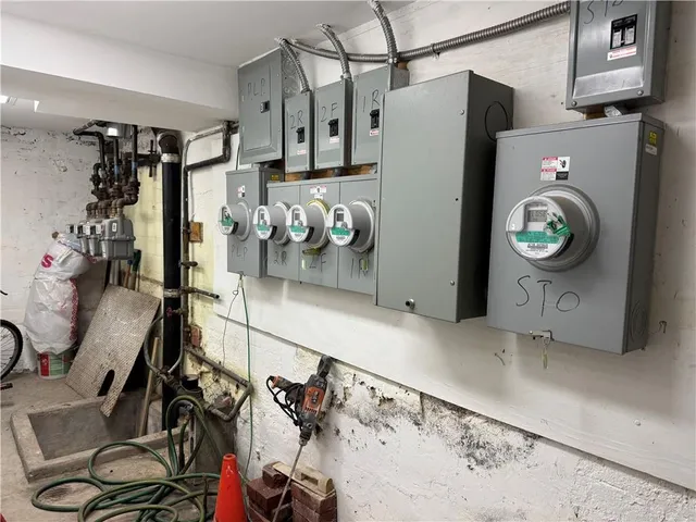 a view of storage and utility room with washer and dryer
