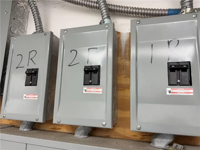 a view of a hallway with entryway wooden floor and front door