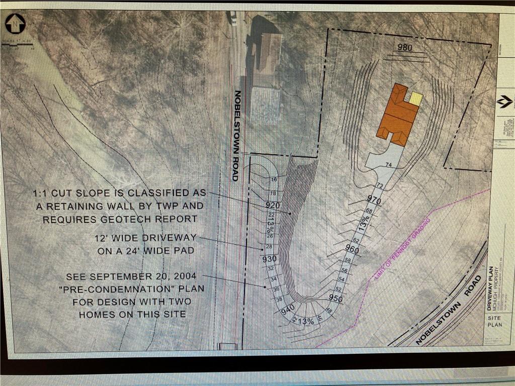 1242 Noblestown Road Carnegie, PA 15106 - Photo 5 of 6 a picture of a bathroom with a shower and a mirror