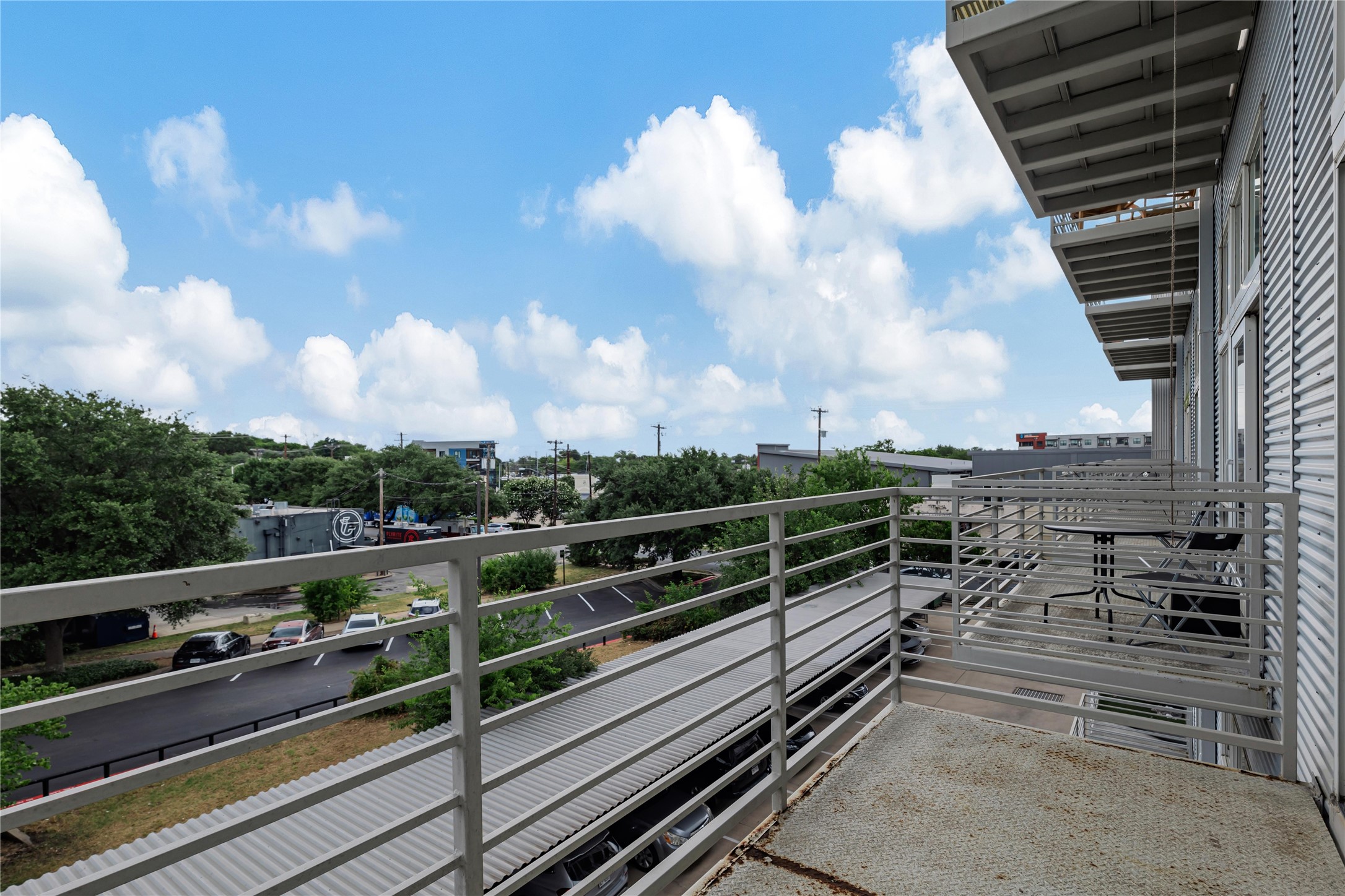 2124 East 6th Street, Unit 305 Austin, TX 78702 - Photo 24 of 35 a view of a balcony with city view