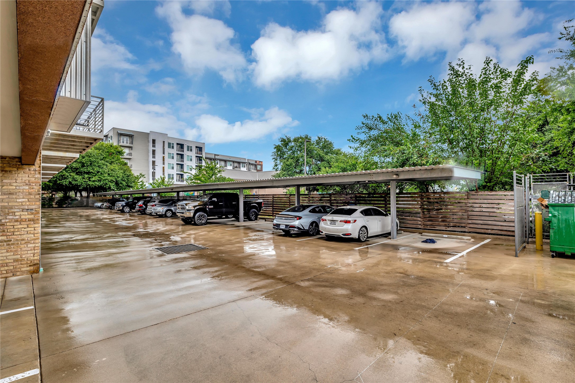 2124 East 6th Street, Unit 305 Austin, TX 78702 - Photo 33 of 35 a view of outdoor space with deck and barbeque oven