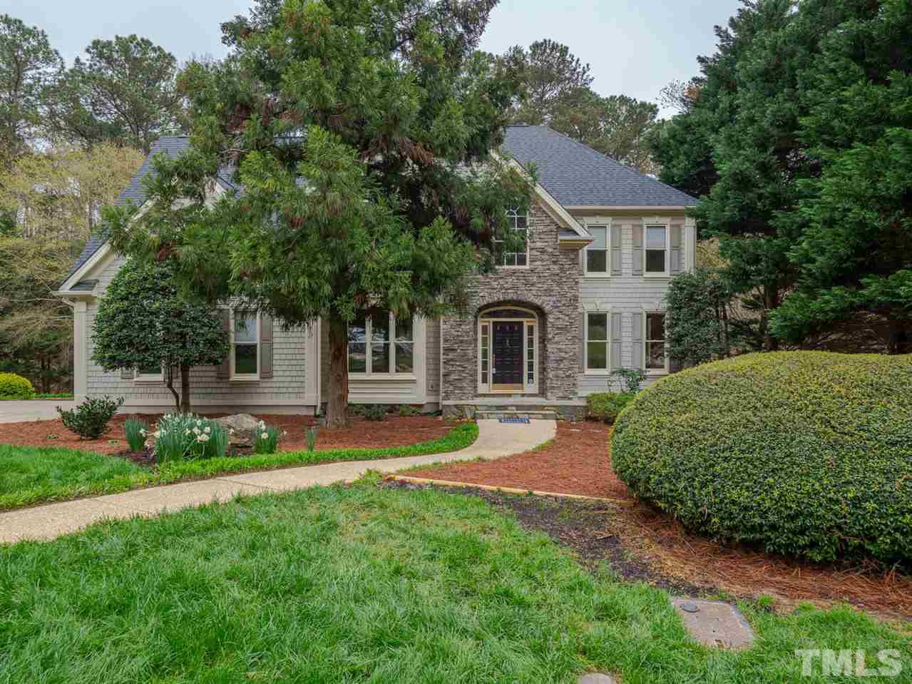 206 Chiselhurst Way Cary, NC 27513 - Photo 1 of 30 a house view with a sitting space and garden