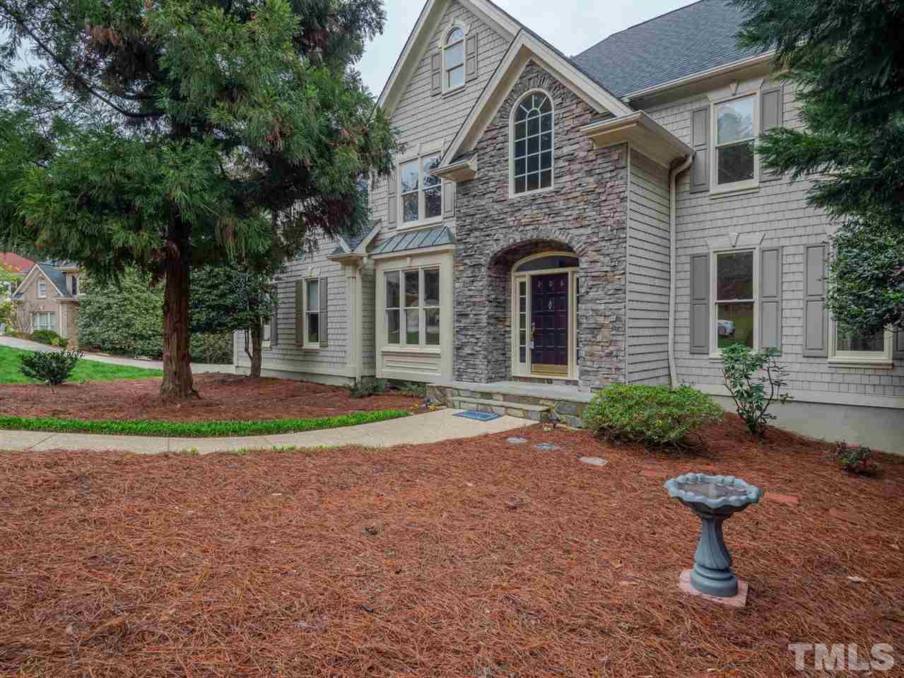 206 Chiselhurst Way Cary, NC 27513 - Photo 2 of 30 a front view of a house with garden
