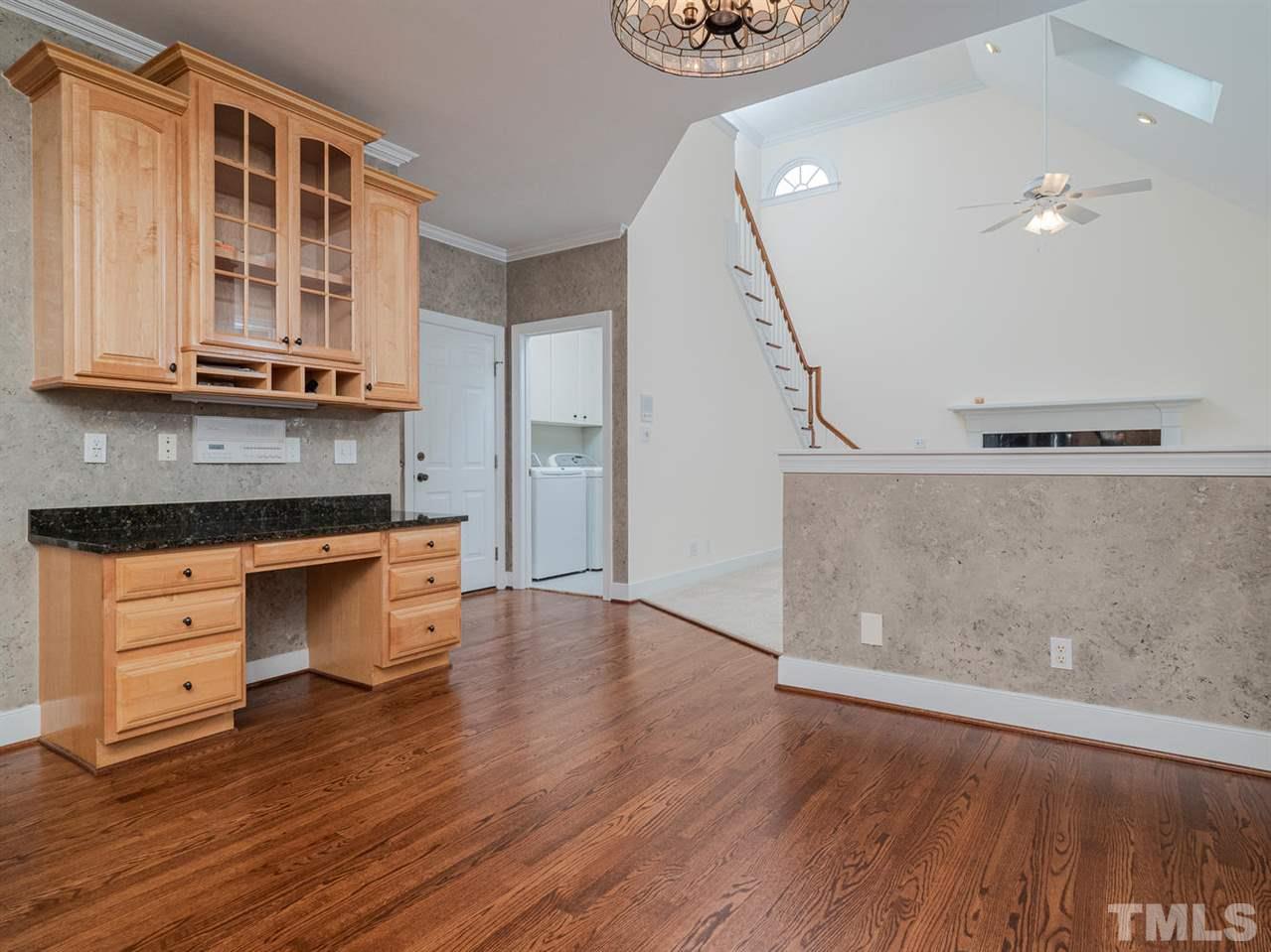 206 Chiselhurst Way Cary, NC 27513 - Photo 15 of 30 a kitchen with a refrigerator and a stove