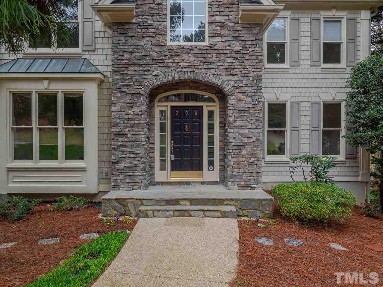 206 Chiselhurst Way Cary, NC 27513 - Photo 3 of 30 a front view of a house with a yard