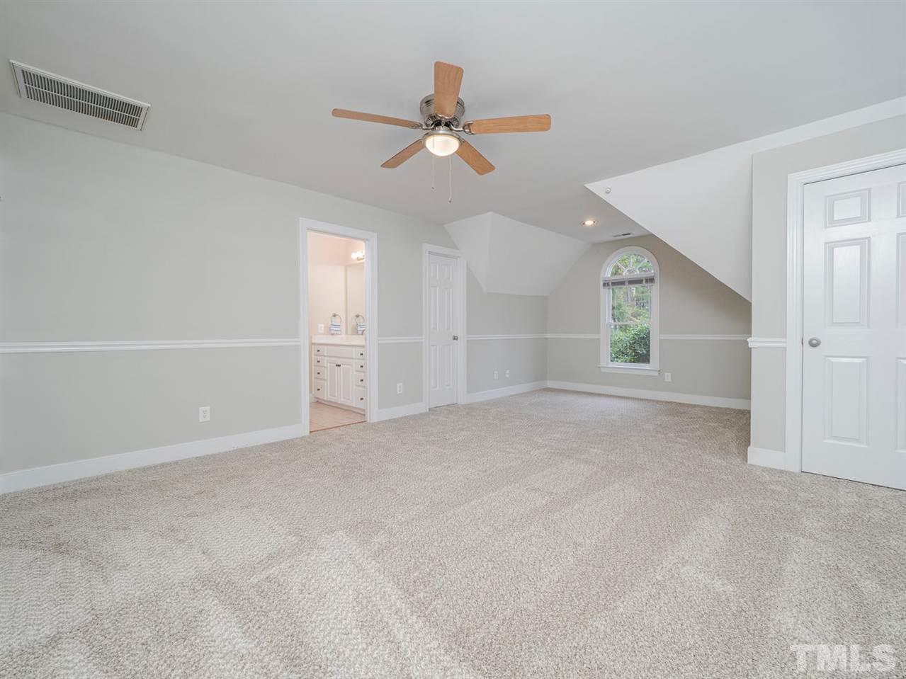 206 Chiselhurst Way Cary, NC 27513 - Photo 23 of 30 a view of an empty room with a window