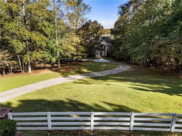a living room with furniture or couch and a large window