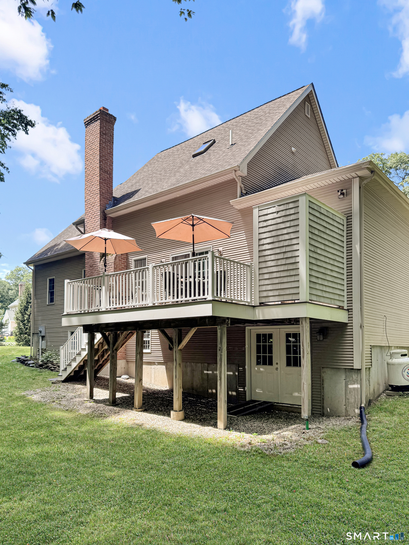 302 Jagger Lane Hebron, CT 06248 - Photo 37 of 40 Deck, Outdoor shower, Walkout basement