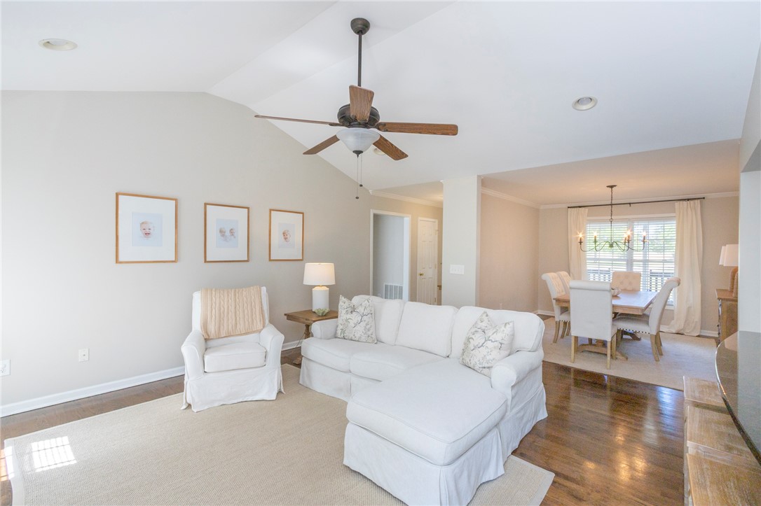208 Mahaffey Road Williamston, SC 29697 - Photo 13 of 44 This inviting space features an open layout connecting living and dining areas, ideal for gatherings.