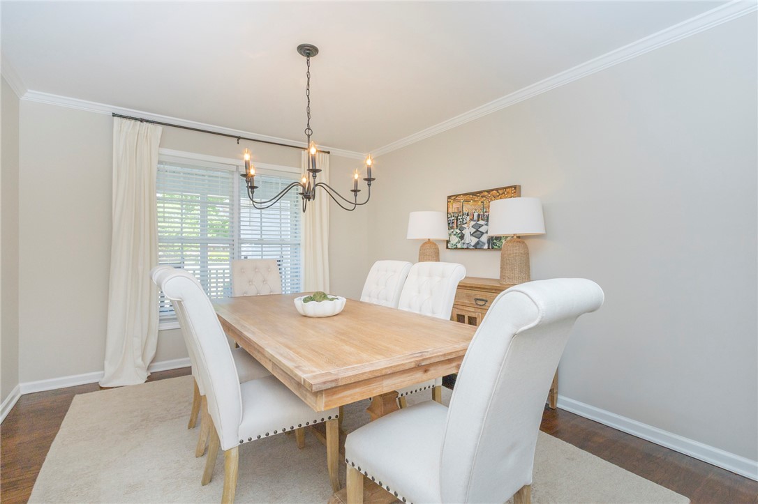 208 Mahaffey Road Williamston, SC 29697 - Photo 17 of 44 This bright dining area features elegant crown molding and rich hardwood flooring, perfect for gatherings.