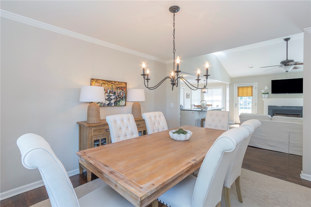 208 Mahaffey Road Williamston, SC 29697 - Photo 18 of 44 This bright dining area flows seamlessly into a spacious living room, perfect for gatherings.