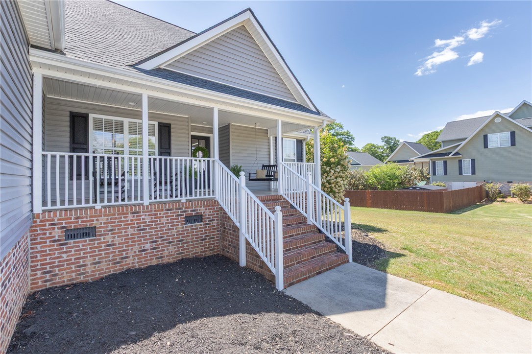 208 Mahaffey Road Williamston, SC 29697 - Photo 2 of 44 This charming home offers a welcoming covered porch, perfect for relaxing.