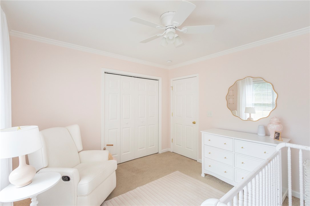 208 Mahaffey Road Williamston, SC 29697 - Photo 24 of 44 This cozy bedroom features warm tones and ample natural light, creating a serene and inviting atmosphere.