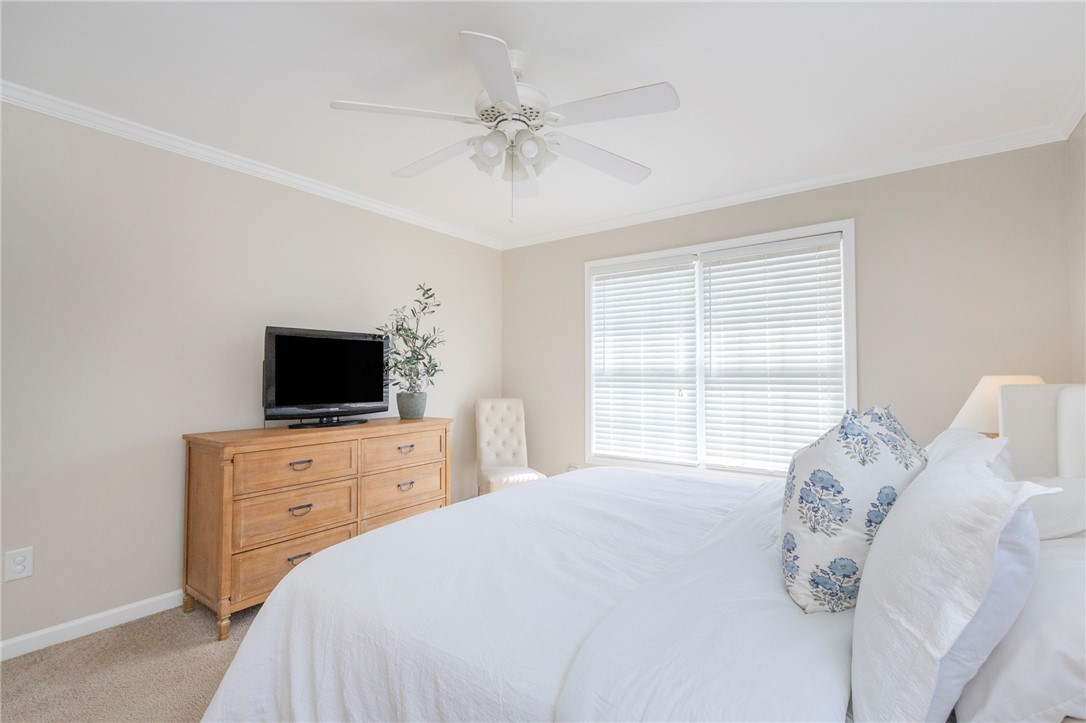208 Mahaffey Road Williamston, SC 29697 - Photo 26 of 44 This serene bedroom offers comfortable carpeting and natural light, perfect for peaceful living.