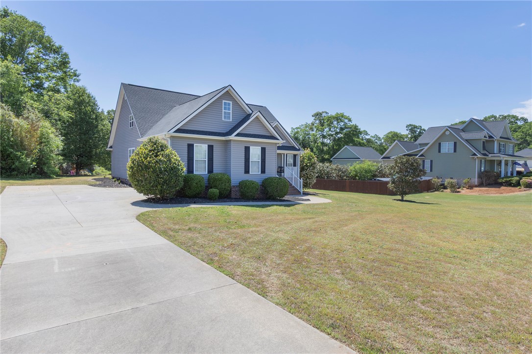 208 Mahaffey Road Williamston, SC 29697 - Photo 43 of 44 This charming residence features a well-maintained exterior and a spacious yard, perfect for outdoor enjoyment.