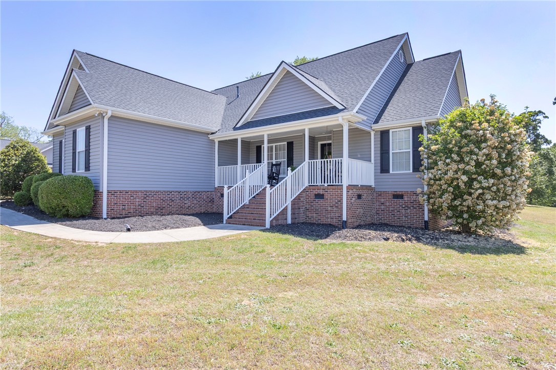 208 Mahaffey Road Williamston, SC 29697 - Photo 44 of 44 This charming residence features a classic exterior with a welcoming porch, perfect for outdoor enjoyment.