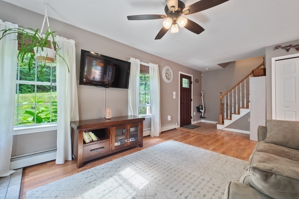 87 Cummington Road Chesterfield, MA 01084 - Photo 7 of 33 a living room with furniture and a flat screen tv