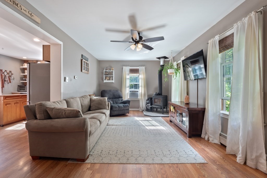 87 Cummington Road Chesterfield, MA 01084 - Photo 8 of 33 a living room with furniture and a wooden floor