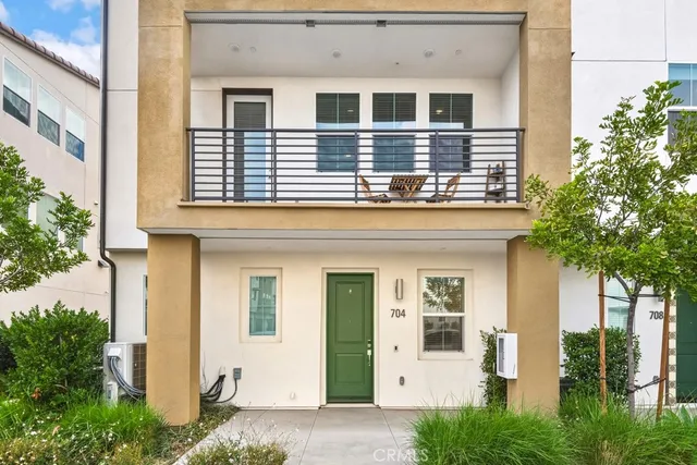 front view of a house with a small yard