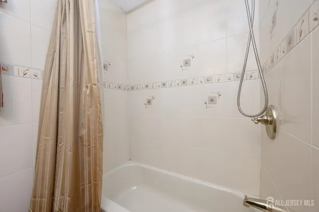 a bathroom with a bathtub