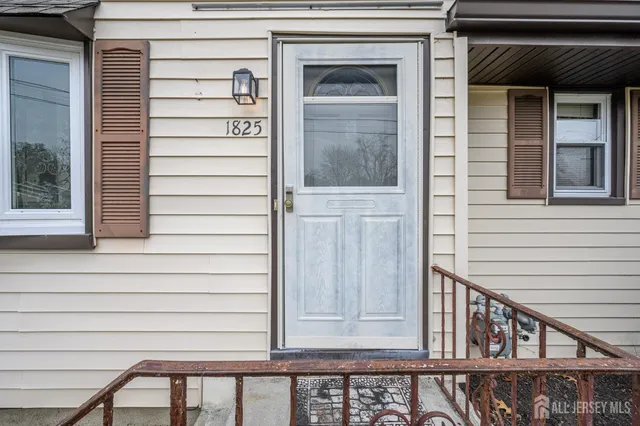 a view of a balcony wooden door