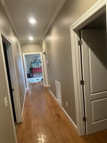 a view of a hallway with painted walls