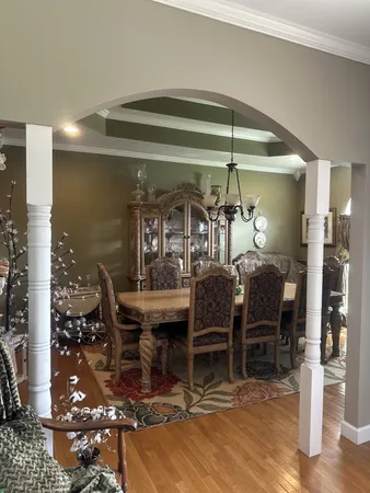 a view of a dining room with furniture