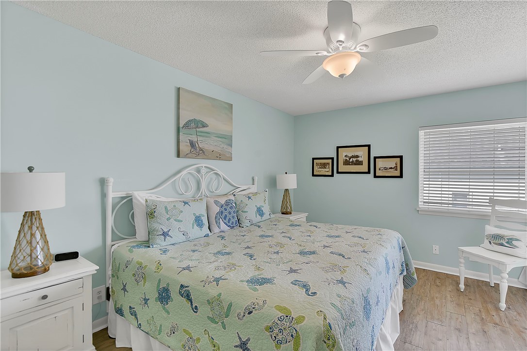 1524 Wood Avenue, Unit 303 St. Simons Island, GA 31522 - Photo 10 of 27 Primary bedroom