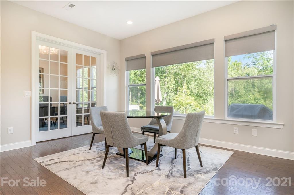 1342 Afton Way Fort Mill, SC 29708 - Photo 14 of 40 a dining room with furniture window and wooden floor