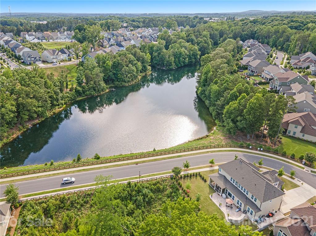 1342 Afton Way Fort Mill, SC 29708 - Photo 4 of 40 an aerial view of a city with lots of residential buildings ocean and mountain view