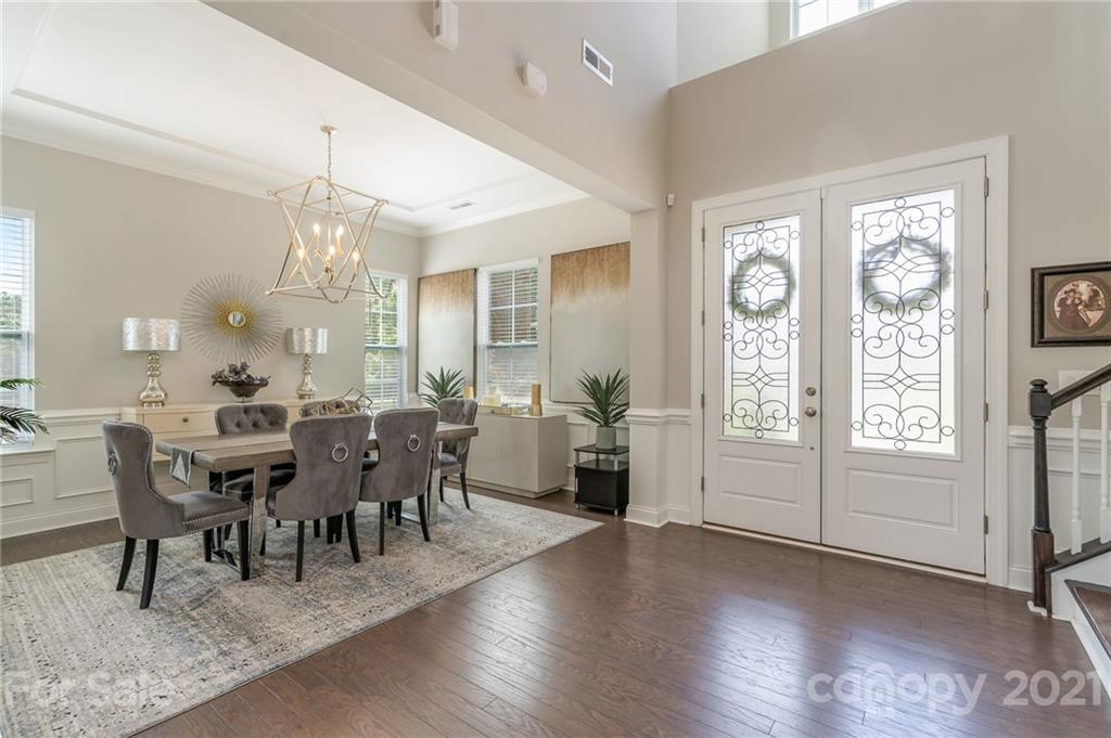 1342 Afton Way Fort Mill, SC 29708 - Photo 5 of 40 a view of a dining room with furniture window and wooden floor