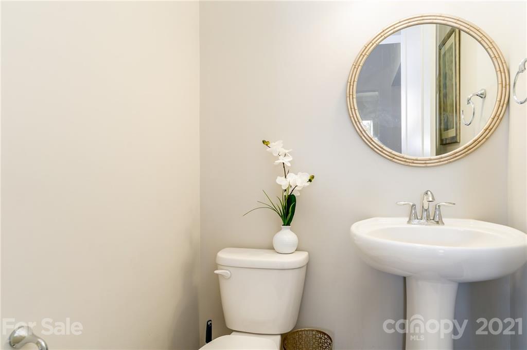 1342 Afton Way Fort Mill, SC 29708 - Photo 7 of 40 a bathroom with a sink a toilet and a mirror