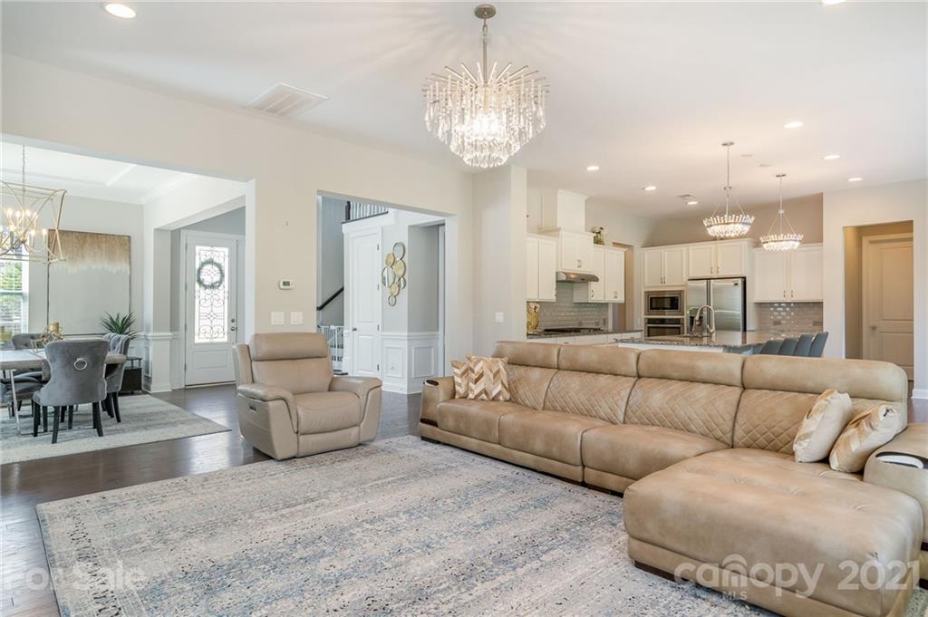 1342 Afton Way Fort Mill, SC 29708 - Photo 9 of 40 a living room with furniture and a large mirror