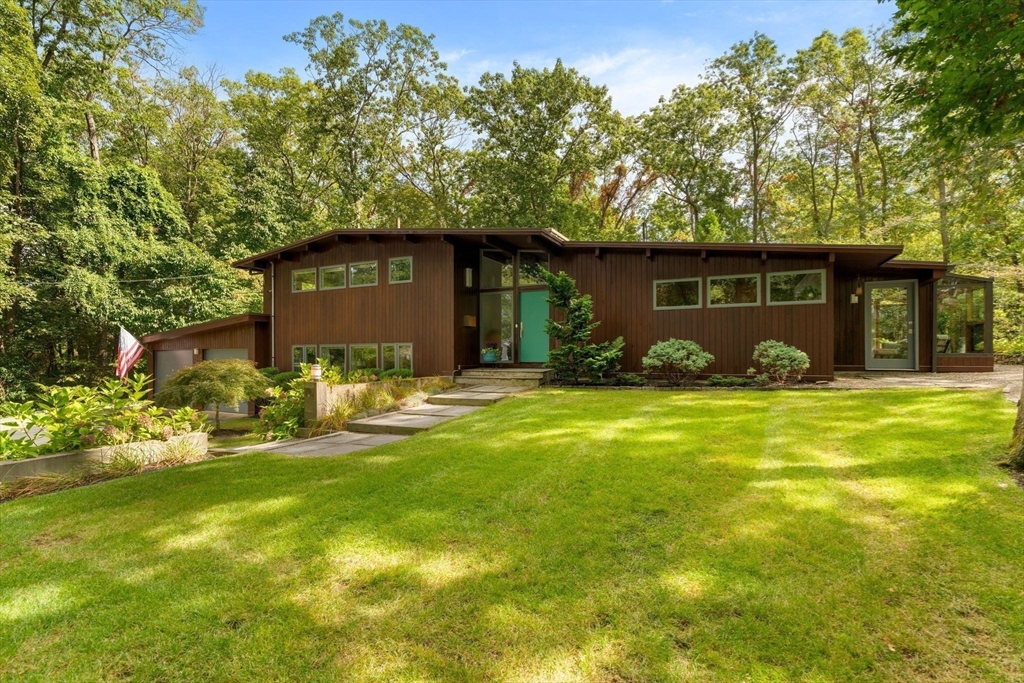 a front view of a house with patio
