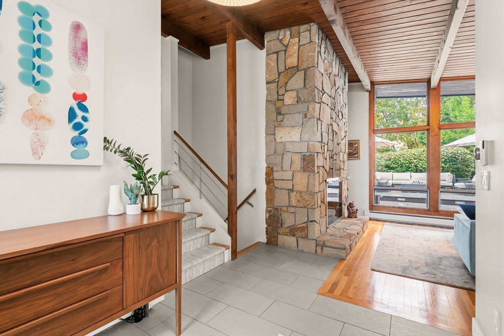 25 Rockwood Road Hingham, MA 02043 - Photo 15 of 32 a living room with furniture and a potted plant