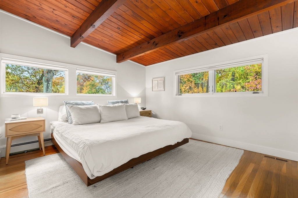 25 Rockwood Road Hingham, MA 02043 - Photo 16 of 32 a bedroom with a bed and a window