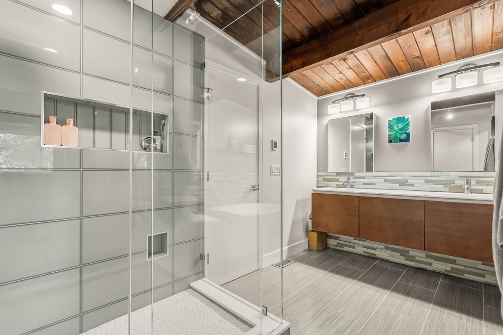 25 Rockwood Road Hingham, MA 02043 - Photo 18 of 32 a bathroom with a sink and a mirror