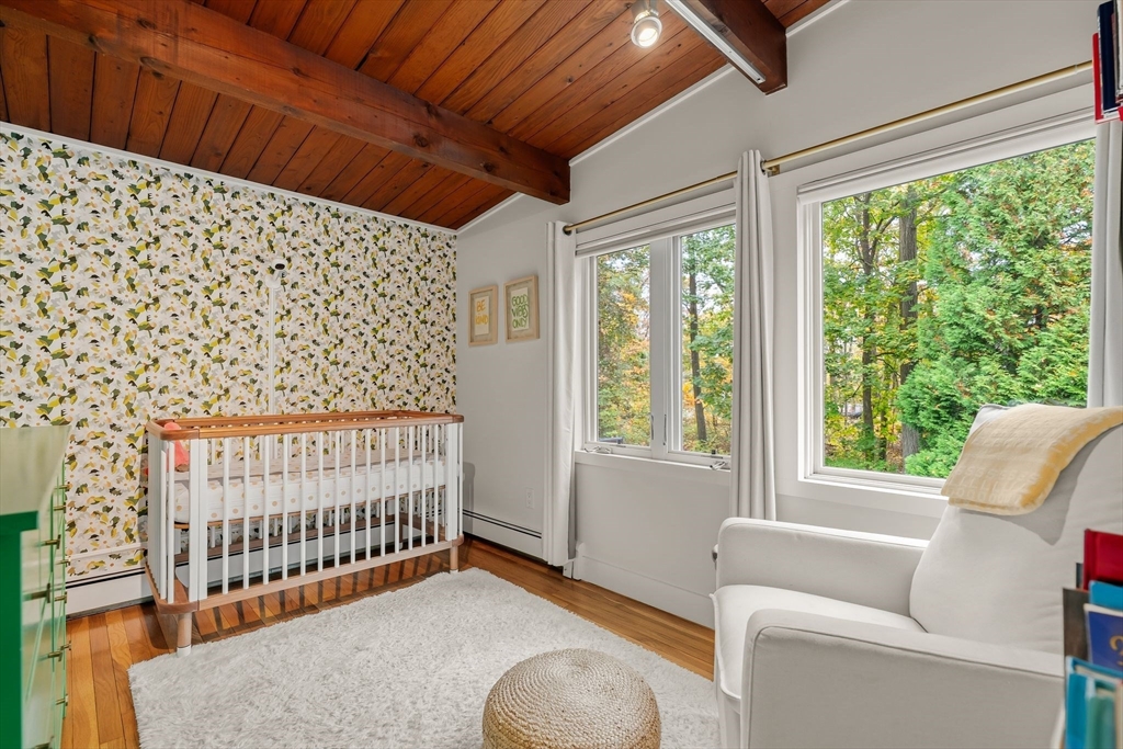 25 Rockwood Road Hingham, MA 02043 - Photo 22 of 32 a view of a bedroom with furniture and a window