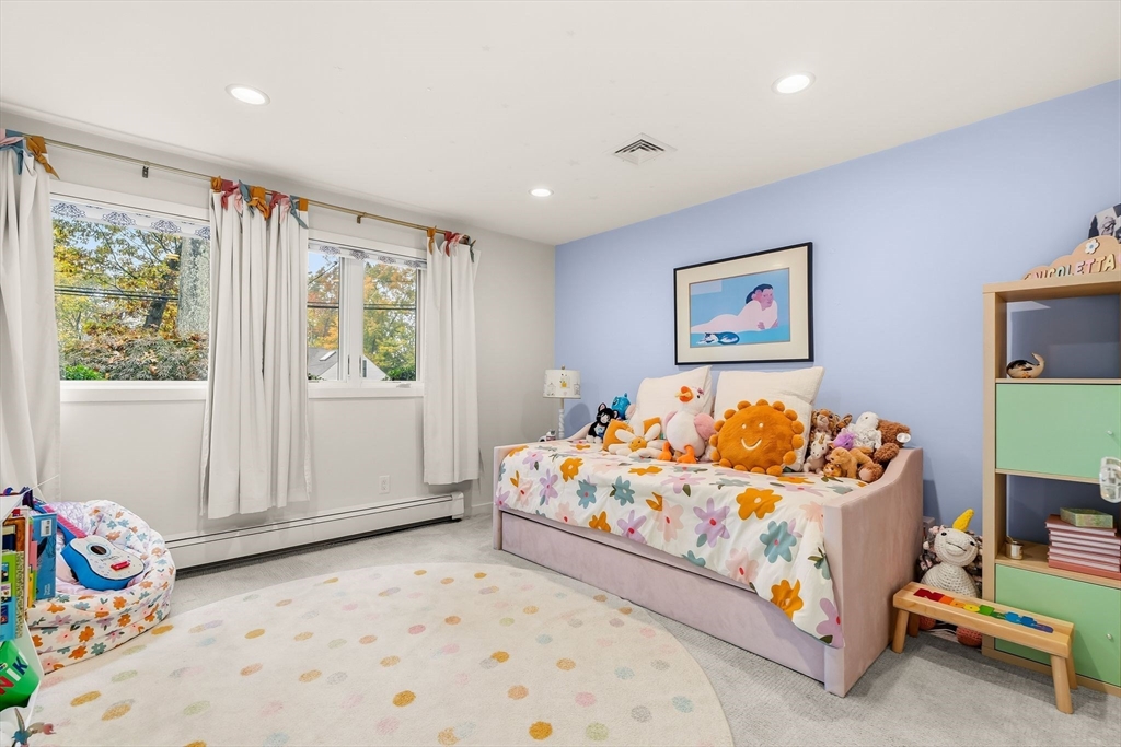 25 Rockwood Road Hingham, MA 02043 - Photo 24 of 32 a bedroom with bed and window