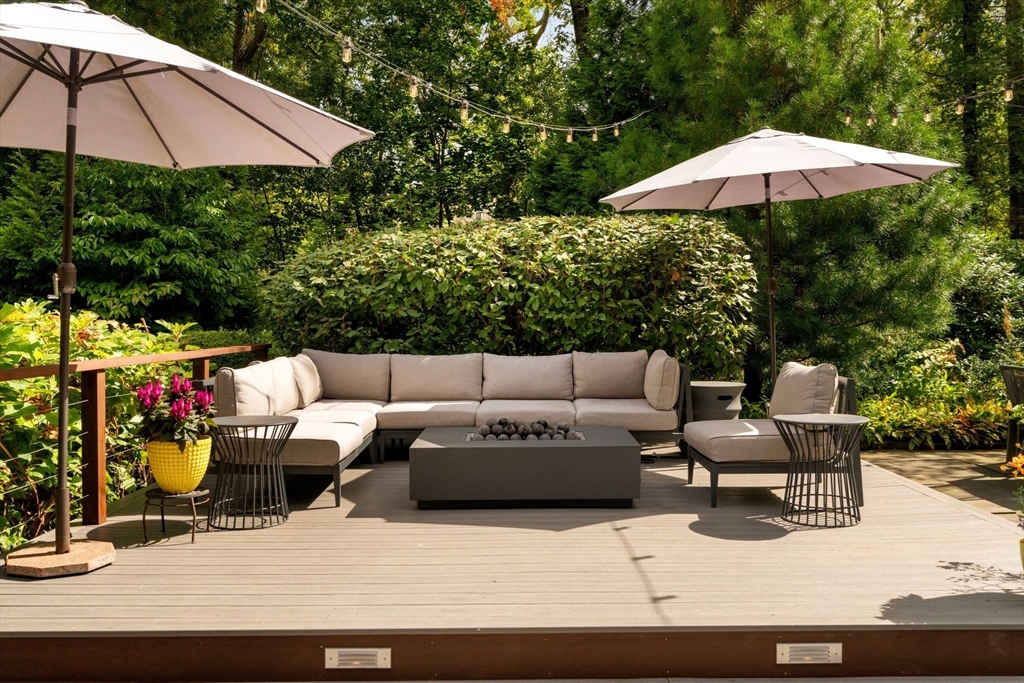 25 Rockwood Road Hingham, MA 02043 - Photo 29 of 32 a terrace of a house with outdoor seating