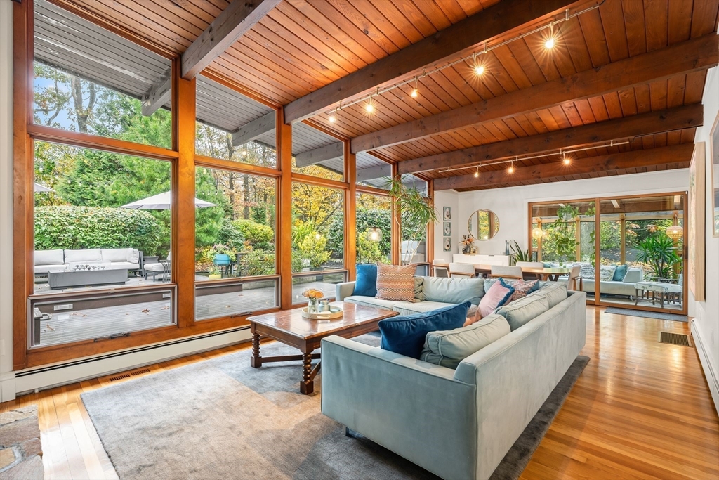 25 Rockwood Road Hingham, MA 02043 - Photo 4 of 32 a living room with furniture and a large window