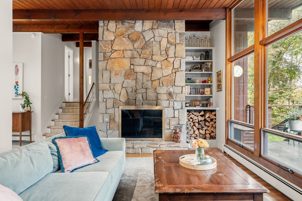 25 Rockwood Road Hingham, MA 02043 - Photo 6 of 32 a living room with furniture and a fireplace